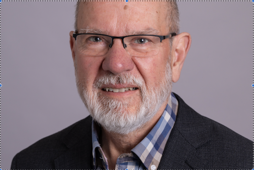 Headshot of Dr. Derek Muir