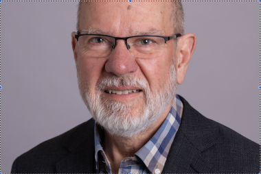 Headshot of Dr. Derek Muir